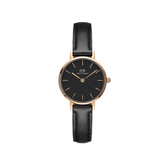 Slim Daniel Wellington women’s watch with a black leather strap, rose gold case, and minimalist black dial featuring rose gold hour markers and hands.