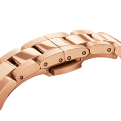 Detail of Daniel Wellington Iconic Link Rose Gold watch bracelet, showing polished rose gold stainless steel links and clasp.