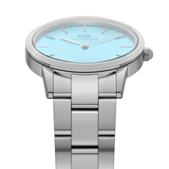 Daniel Wellington Iconic Link Capri Silver watch featuring a pastel blue dial and brushed stainless steel link bracelet.