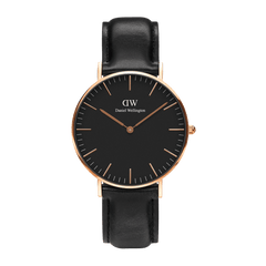 Minimalist Daniel Wellington Classic Sheffield Black Rose Gold watch with a black dial, slim rose gold markers, and a genuine black leather strap.