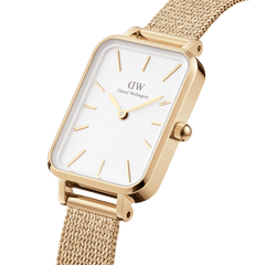 Quadro Pressed Evergold women’s watch with gold mesh strap, rectangular case, and minimalist eggshell white dial.