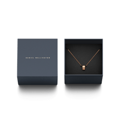 Elan Necklace Rose Gold displayed in an elegant Daniel Wellington gift box, featuring a minimalist rose gold ring pendant on a delicate chain.