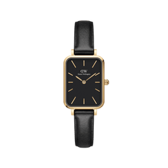 Rectangular gold women’s watch with a black dial, minimalist gold hour markers and hands, and a black leather strap.