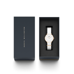 Petite Dover Rose Gold watch with a white NATO strap presented in an elegant Daniel Wellington gift box.