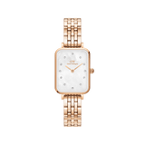 Rectangular rose gold women’s watch with a five-link bracelet, white mother of pearl dial, and crystal hour markers.