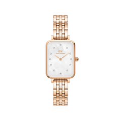 Rectangular rose gold women’s watch with a five-link bracelet, white mother of pearl dial, and crystal hour markers.