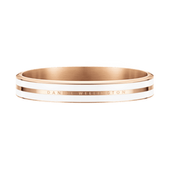 Satin white enamel and rose gold bangle with Daniel Wellington engraving, featuring a sleek, modern design and polished finish.