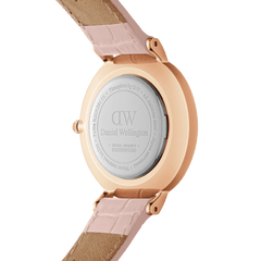 Back view of Petite Rouge Rose Gold women’s watch showing engraved case and nude pink croc-pattern leather strap.