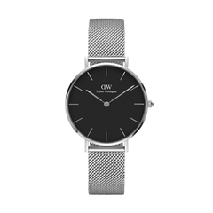 Daniel Wellington Petite Sterling women’s watch with black dial, silver mesh strap, and minimalist hour markers.