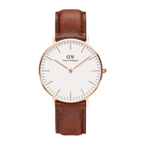 Rose gold Daniel Wellington Classic St Mawes watch with white minimalist dial and brown genuine leather strap.