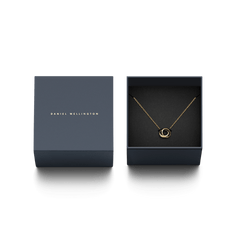 Classic Lumine Unity Gold necklace with interlocking gold circles presented in an elegant Daniel Wellington gift box.
