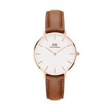 Daniel Wellington Petite Durham Rose Gold women’s watch with a slim rose gold case, minimalist white dial, and light brown leather strap.