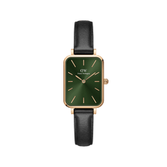 Rectangular women’s watch with an emerald green dial, rose gold-plated case, minimalist markers, and a black leather strap.