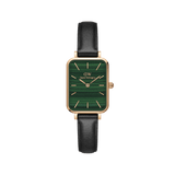 Rectangular women’s watch featuring a malachite-inspired green dial, rose gold case, minimalist markers, and a slim black leather strap.