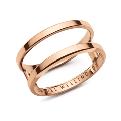 Polished rose gold dual band ring with a modern open structure and subtle Daniel Wellington engraving on the inside.