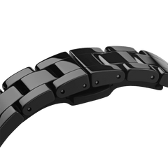 Close-up of the Iconic Link Ceramic watch’s glossy black ceramic bracelet links, highlighting the smooth, polished finish and adjustable design.