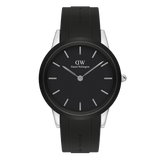 Daniel Wellington Iconic Motion watch featuring a black dial, minimalist silver hour markers, and a black FKM rubber strap with subtle branding, set in a polished 40mm stainless steel case.
