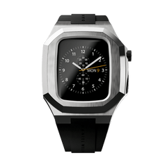 Daniel Wellington Switch Silver Apple Watch case fitted to a 40mm Apple Watch, featuring a brushed stainless steel geometric bezel and black rubber strap with a classic analogue watch face display.