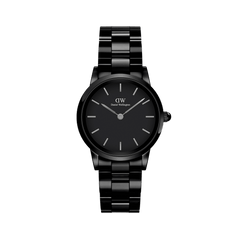Sleek black ceramic watch with a polished link bracelet, minimalist black dial, and silver-tone hour markers and hands.