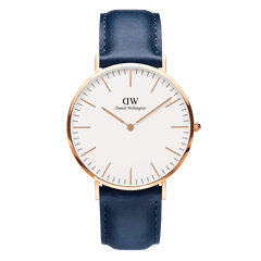 Classic Somerset watch featuring a rose gold 40mm case, minimalist eggshell white dial, and a navy blue leather strap.