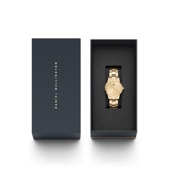 Daniel Wellington Iconic Link Unitone G gold women’s watch presented in signature navy gift box, ideal for gifting.