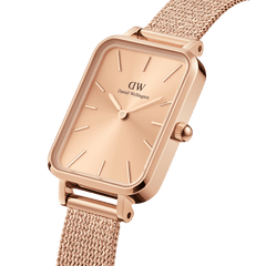 Quadro Pressed Unitone rose gold women’s watch with a rectangular dial, minimalist hour markers, and a pressed mesh strap in a polished finish.