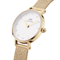 Elegant Petite Lumine Pressed Evergold women’s watch with gold mesh strap, white dial, and crystal hour markers.