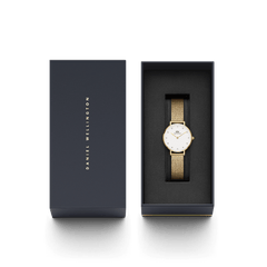 Petite Lumine Pressed Evergold women’s gold mesh watch with crystal markers, presented in a Daniel Wellington gift box.