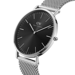 Classic Mesh Onyx watch with a sleek black sunray dial, minimalist silver hour markers, and a polished stainless steel mesh strap.