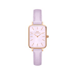 Rectangular rose gold women’s watch with a lavender mother of pearl dial and a pastel purple Italian leather strap.