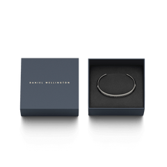 Daniel Wellington Classic Bracelet in graphite presented in an elegant navy gift box with gold branding.