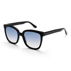 Grande Bio-Acetate Black Blue sunglasses featuring an oversized square black frame with blue gradient lenses and Daniel Wellington branding on the arm.