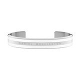 Daniel Wellington Emalie Bracelet in polished silver-tone stainless steel with satin white enamel and subtle engraved branding, shown as a sleek open cuff.