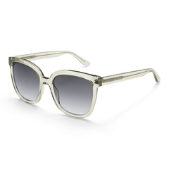 Grande Bio-Acetate Olive Olive sunglasses featuring oversized square translucent olive frames and black gradient lenses, shown from an angled side view.