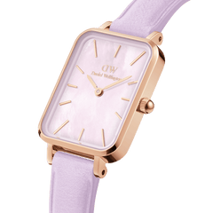 Rose gold rectangular women’s watch featuring a lavender mother of pearl dial and a pastel purple Italian leather strap.