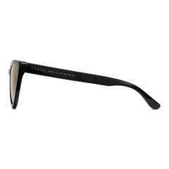 Side view of the Lynx Bio-Acetate Black / Yellow sunglasses showing the glossy black cat eye frame, yellow lens edge, and Daniel Wellington branding along the arm.